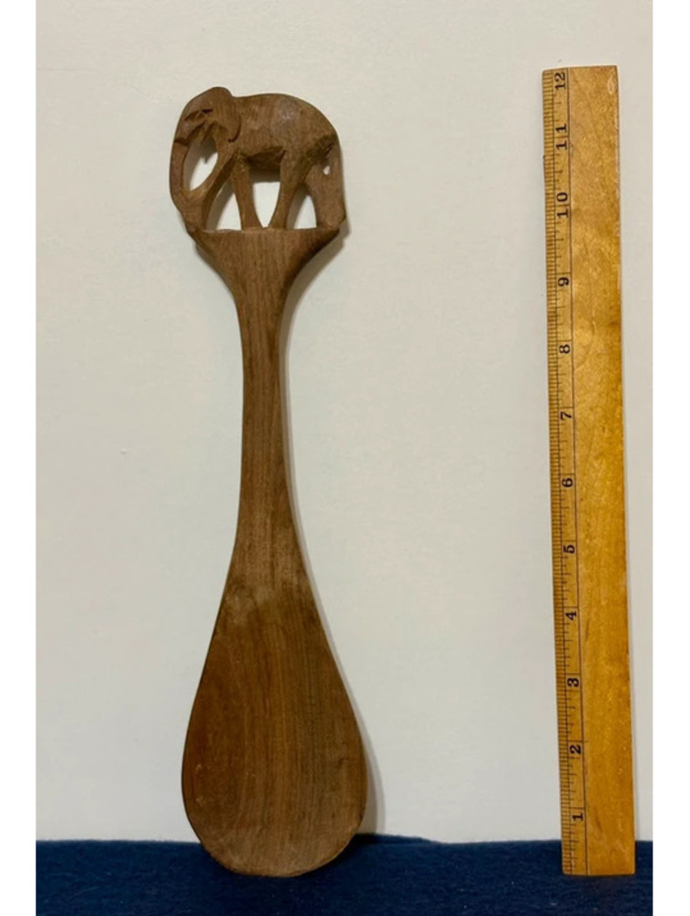 vintage hand-carved wooden serving spoon, carved elephant handle